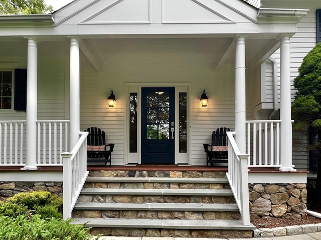 262 Linden Tree Rd, Wilton, CT 06897 - doorway to property featuring a porch