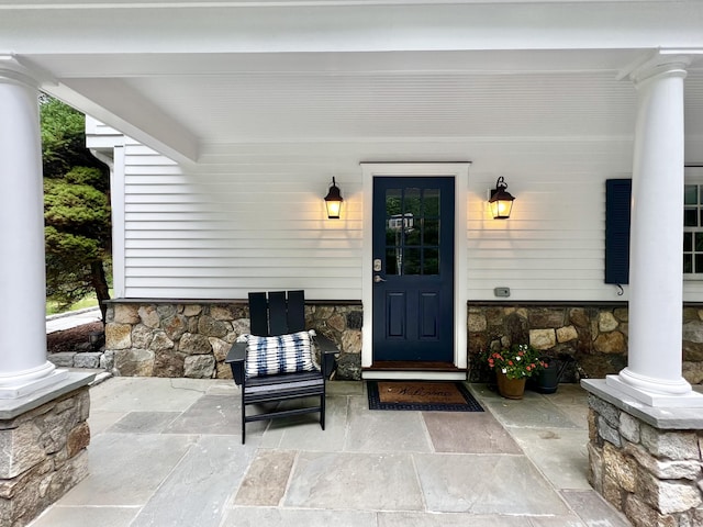 262 Linden Tree Rd, Wilton, CT 06897 - entrance to property featuring stone siding and covered porch