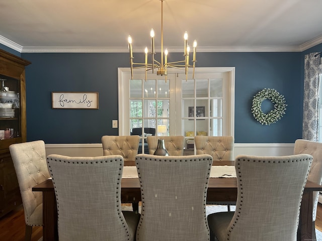 262 Linden Tree Rd, Wilton, CT 06897 - dining area with a chandelier, ornamental molding, and a wainscoted wall