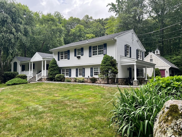 262 Linden Tree Rd, Wilton, CT 06897 - view of front of property with covered porch and a front lawn
