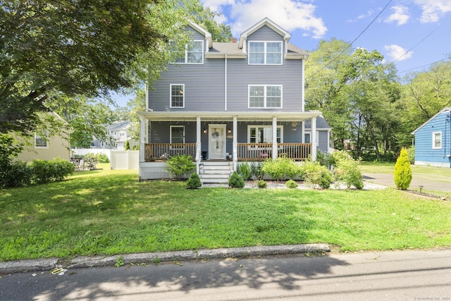 170 Red Oak Rd, Bridgeport, CT 06606 - view of front of property featuring covered porch and a front lawn