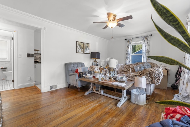 170 Red Oak Rd, Bridgeport, CT 06606 - living area with ceiling fan, wood finished floors, and ornamental molding