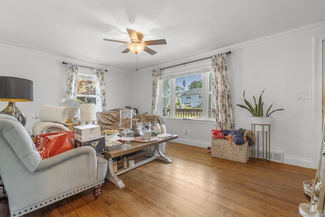 170 Red Oak Rd, Bridgeport, CT 06606 - living area featuring a ceiling fan, wood finished floors, and crown molding