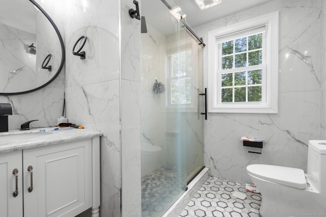 170 Red Oak Rd, Bridgeport, CT 06606 - bathroom featuring tile walls, a marble finish shower, and vanity