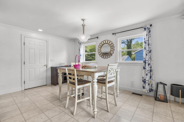 170 Red Oak Rd, Bridgeport, CT 06606 - dining space with crown molding, light tile patterned floors, and recessed lighting