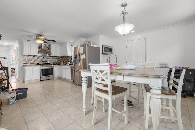 170 Red Oak Rd, Bridgeport, CT 06606 - dining area with ceiling fan, ornamental molding, light tile patterned floors, and recessed lighting
