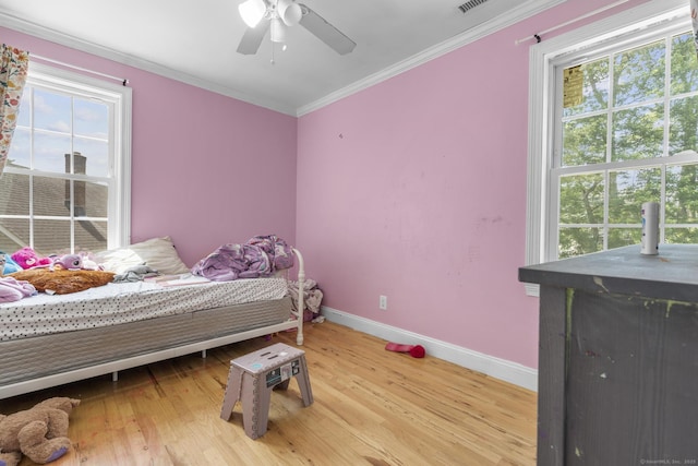 170 Red Oak Rd, Bridgeport, CT 06606 - bedroom with light wood-style flooring, crown molding, and a ceiling fan