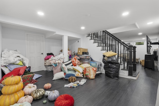 170 Red Oak Rd, Bridgeport, CT 06606 - living room featuring wood finished floors, stairs, and recessed lighting