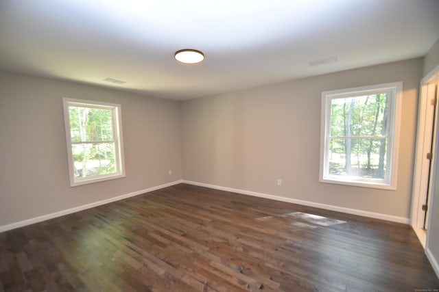 152 Buff Cap Rd, Tolland, CT 06084 - spare room featuring plenty of natural light and dark wood-type flooring