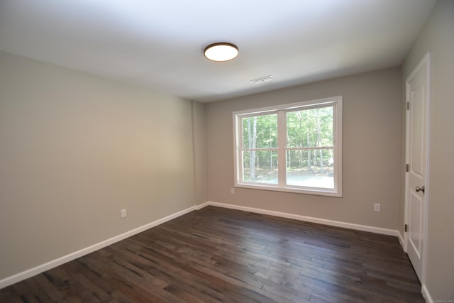152 Buff Cap Rd, Tolland, CT 06084 - empty room featuring dark wood-style floors and baseboards