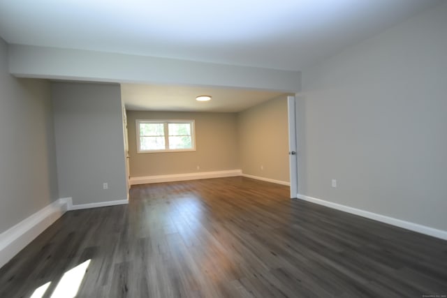 152 Buff Cap Rd, Tolland, CT 06084 - empty room with dark wood-type flooring and baseboards