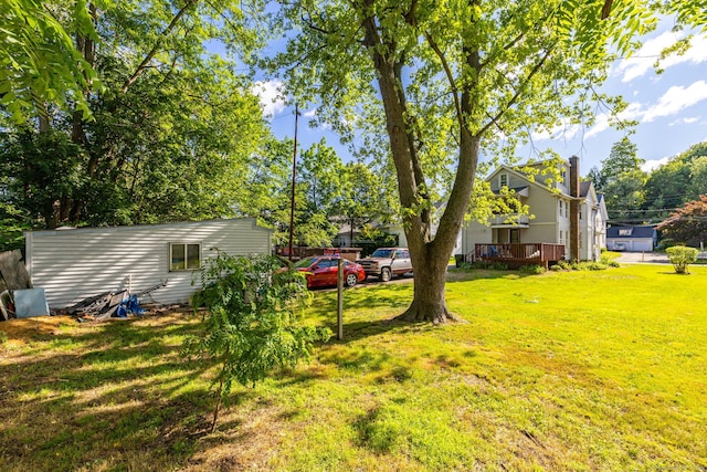 45 William St, East Hartford, CT 06108 - view of grassy yard with a deck