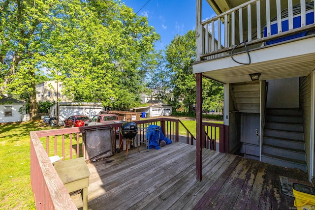 45 William St, East Hartford, CT 06108 - wooden deck with a yard, a grill, and an outbuilding