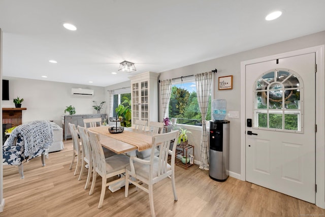 13 Baldwin Hill Rd, Litchfield, CT 06759 - dining space featuring light wood-type flooring, an AC wall unit, and recessed lighting