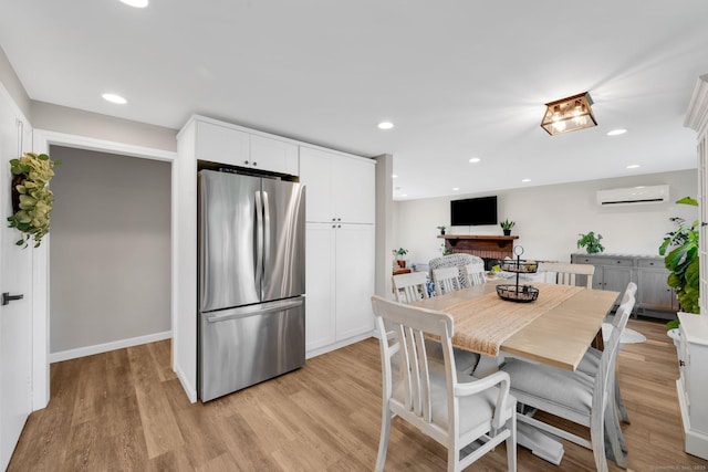 13 Baldwin Hill Rd, Litchfield, CT 06759 - dining area featuring a wall unit AC, light wood-style flooring, and recessed lighting