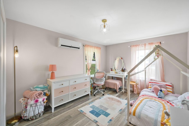 13 Baldwin Hill Rd, Litchfield, CT 06759 - bedroom featuring a wall mounted AC and wood finished floors