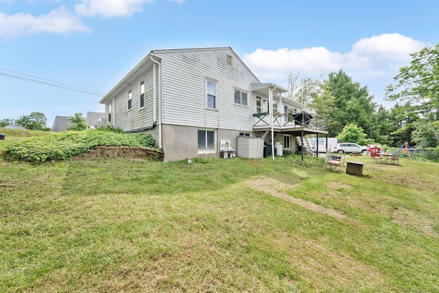 13 Baldwin Hill Rd, Litchfield, CT 06759 - rear view of house with a lawn and a wooden deck