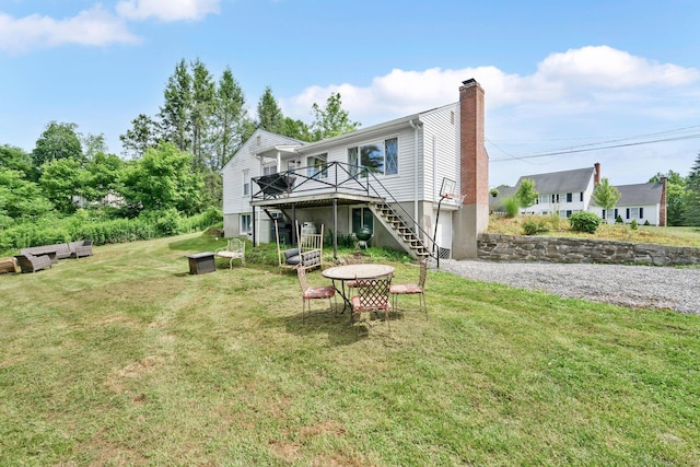 13 Baldwin Hill Rd, Litchfield, CT 06759 - back of house with stairway, a chimney, a wooden deck, and a lawn