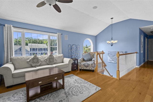 8 Barbara Ln, Southington, CT 06479 - living room with a ceiling fan, vaulted ceiling, wood finished floors, and a chandelier
