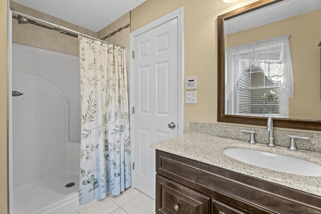 8 Barbara Ln, Southington, CT 06479 - full bathroom featuring vanity, curtained shower, and tile patterned flooring
