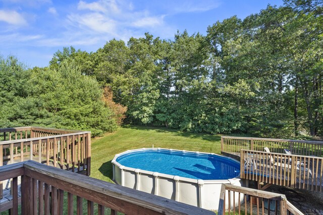 8 Barbara Ln, Southington, CT 06479 - outdoor pool with a wooden deck and a lawn