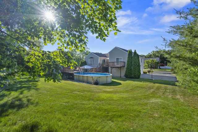 8 Barbara Ln, Southington, CT 06479 - view of grassy yard featuring a deck and an outdoor pool