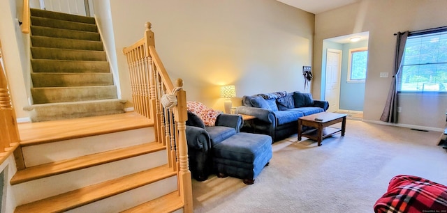 145 Brighton Cir, Windsor, CT 06095 - carpeted living area with stairway