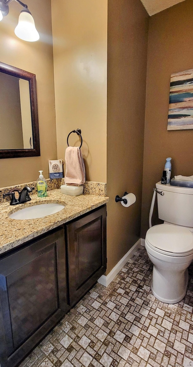 145 Brighton Cir, Windsor, CT 06095 - half bath with vanity and brick patterned flooring