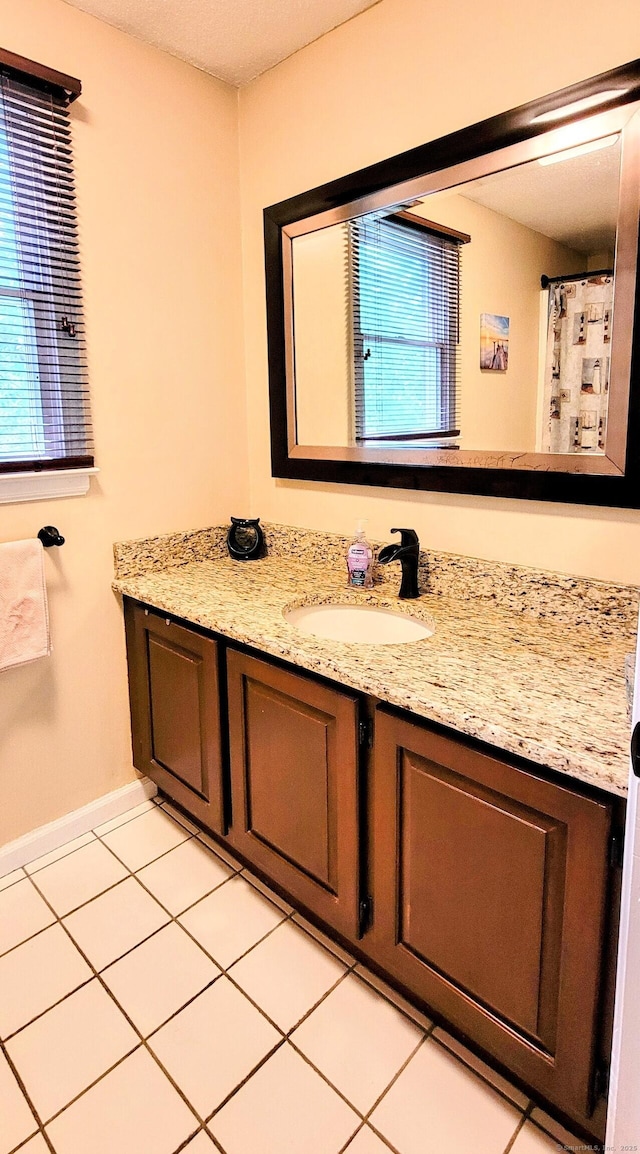 145 Brighton Cir, Windsor, CT 06095 - full bath featuring vanity and tile patterned floors
