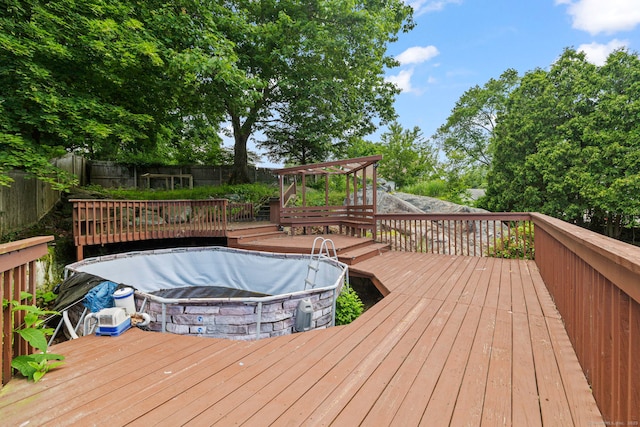 21 Gilbert Hill Rd, Norwalk, CT 06853 - wooden terrace featuring a fenced backyard
