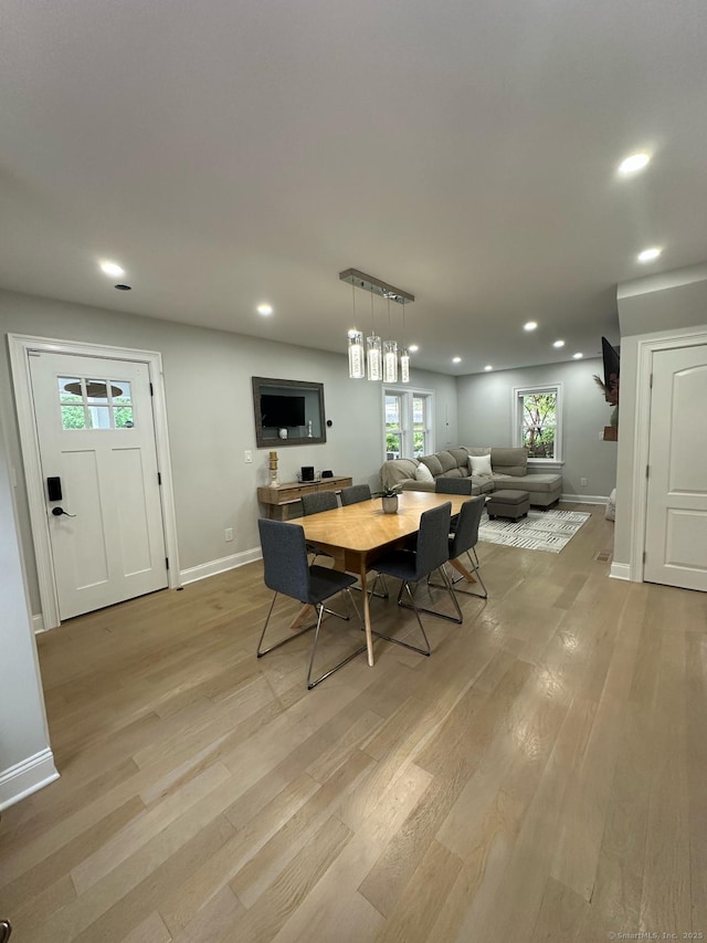60 Carlson Ave, Bridgeport, CT 06606 - dining area with light wood-type flooring and recessed lighting