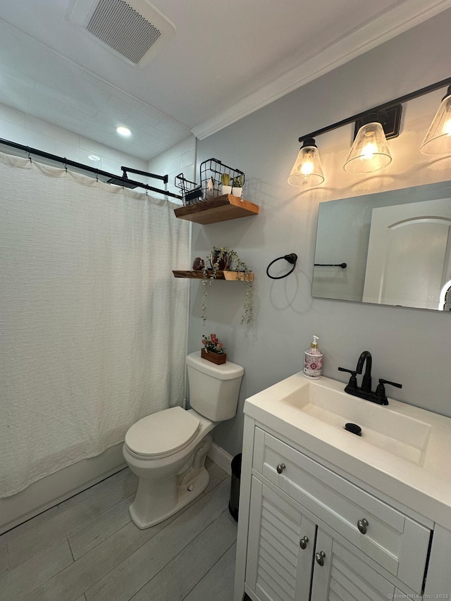 60 Carlson Ave, Bridgeport, CT 06606 - full bath featuring vanity, crown molding, and shower / bath combo with shower curtain