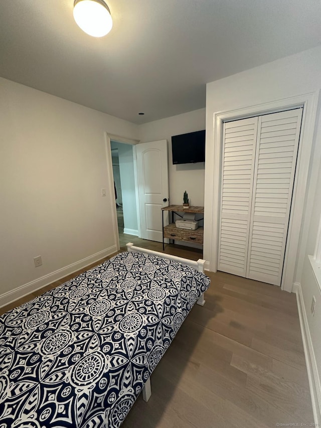 60 Carlson Ave, Bridgeport, CT 06606 - bedroom with a closet and wood finished floors