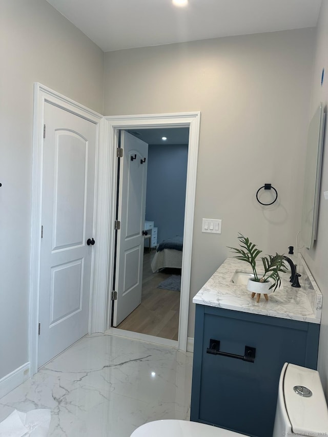 60 Carlson Ave, Bridgeport, CT 06606 - ensuite bathroom featuring vanity and marble finish floors