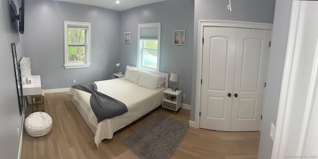 60 Carlson Ave, Bridgeport, CT 06606 - bedroom featuring light wood-type flooring, a closet, and recessed lighting