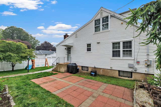 1462 Cutspring Rd, Stratford, CT 06614 - back of property featuring a patio area and a chimney