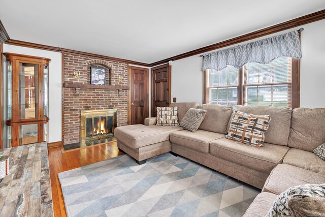 1462 Cutspring Rd, Stratford, CT 06614 - living room with crown molding, a brick fireplace, and wood-type flooring