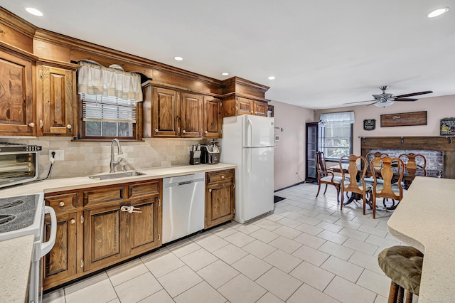 1462 Cutspring Rd, Stratford, CT 06614 - kitchen featuring white appliances, a ceiling fan, light countertops, decorative backsplash, and recessed lighting