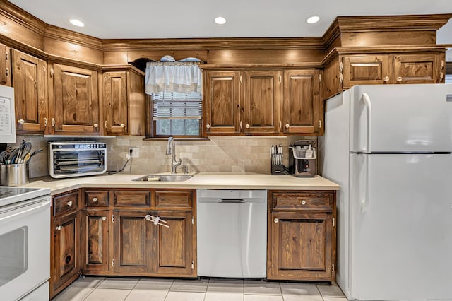 1462 Cutspring Rd, Stratford, CT 06614 - kitchen with white appliances, light tile patterned floors, light countertops, tasteful backsplash, and recessed lighting