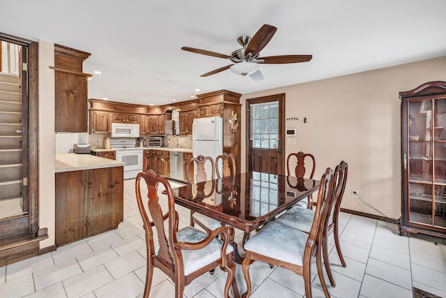 1462 Cutspring Rd, Stratford, CT 06614 - dining space featuring stairway, a ceiling fan, light tile patterned floors, and recessed lighting