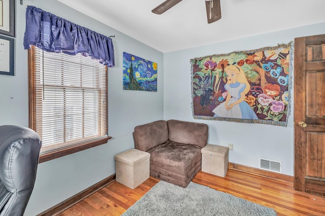 1462 Cutspring Rd, Stratford, CT 06614 - living area featuring wood finished floors and a ceiling fan