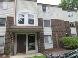 7 Padanaram Rd Unit I184, Danbury, CT 06811 - back of property featuring brick siding