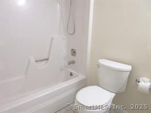 7 Padanaram Rd Unit I184, Danbury, CT 06811 - bathroom featuring shower / bath combination and toilet