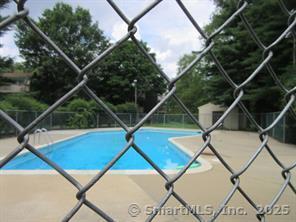 7 Padanaram Rd Unit I184, Danbury, CT 06811 - view of pool featuring a patio