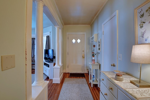 32 Columbus St, East Hartford, CT 06108 - foyer featuring decorative columns, dark wood-style floors, and ornamental molding