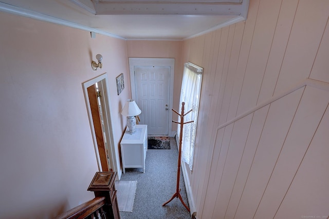 32 Columbus St, East Hartford, CT 06108 - foyer with ornamental molding, carpet floors, and wood walls