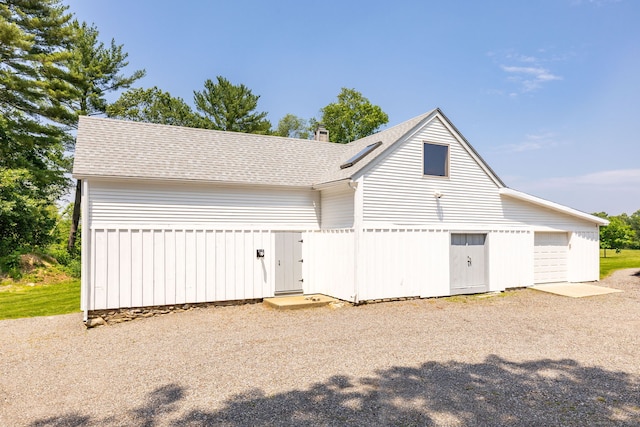 1669 Rte 169, Woodstock, CT 06281 - view of front of house featuring roof with shingles and a chimney