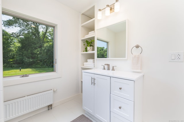 1669 Rte 169, Woodstock, CT 06281 - bathroom featuring radiator, vanity, and tile patterned flooring