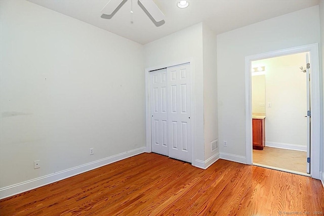 66 Watkins Dr Unit 66, Newtown, CT 06482 - unfurnished bedroom with light wood-style flooring, a closet, recessed lighting, and ceiling fan