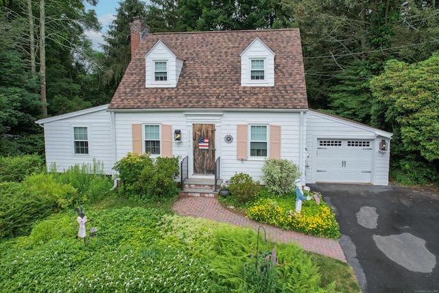 1775 Orchard Hill Rd, Cheshire, CT 06410 - cape cod home with a chimney, roof with shingles, asphalt driveway, and an attached garage